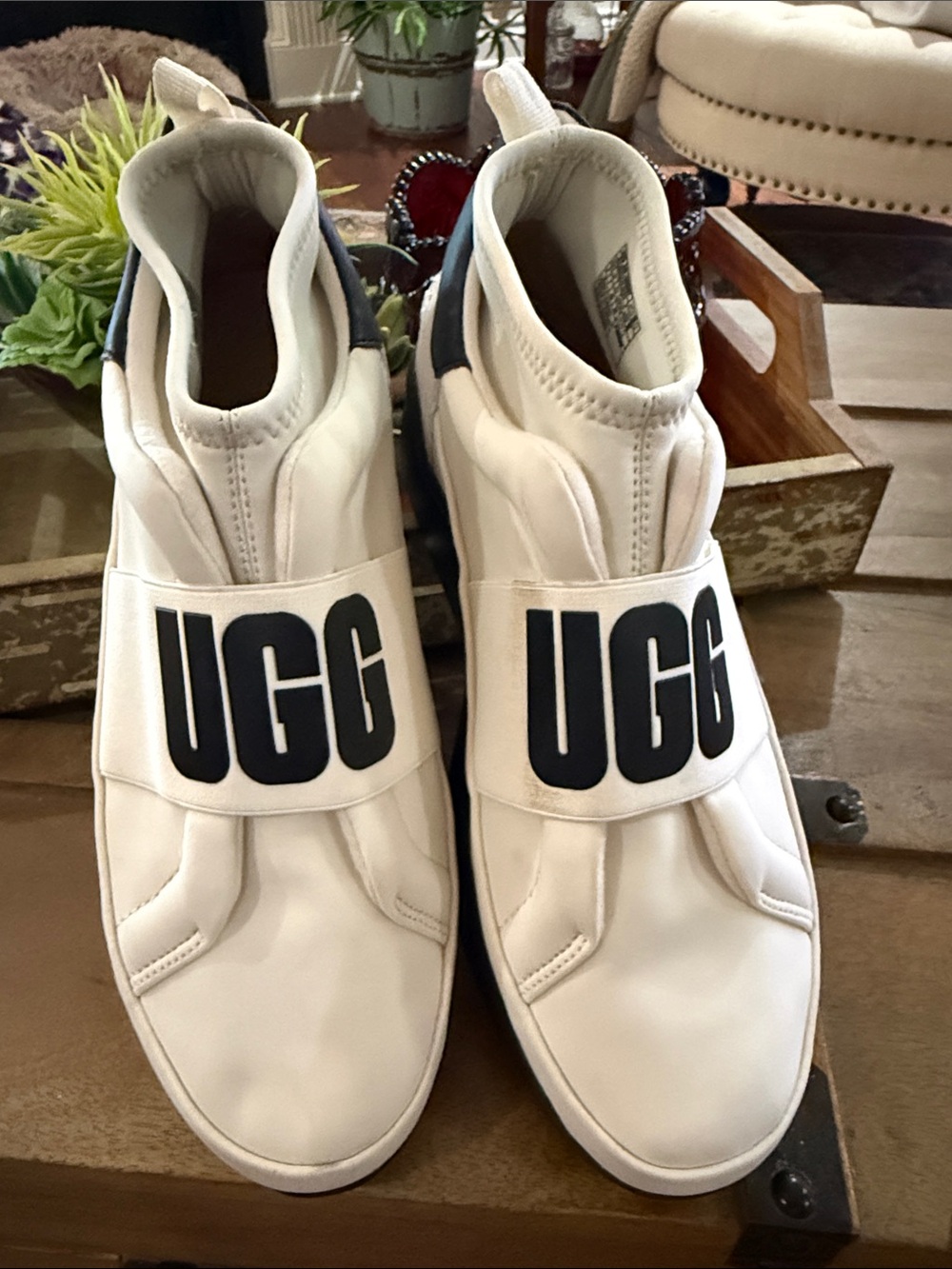 UGG White Slip-On Athletic Sneakers with Black Logo Strap